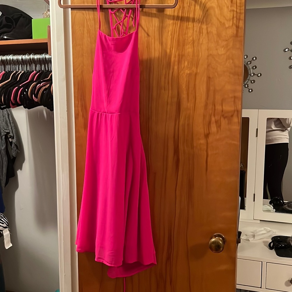 Pink mini dress with criss cross open back